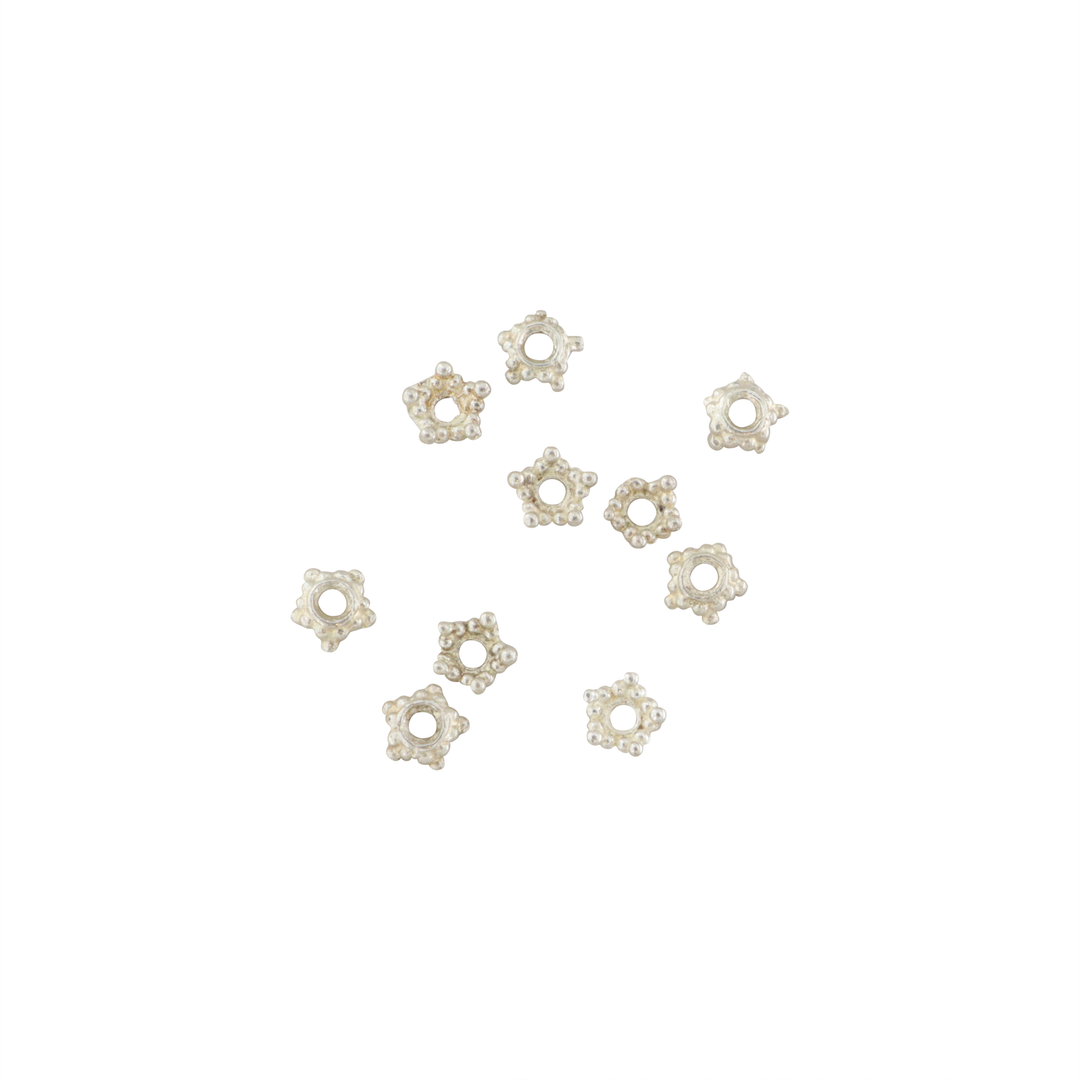 Find Perlecaps, filigran stjerne, forsĂžlvet messing, 6x2 mm. storkĂžb hos Beadhouse of Copenhagen i dag, med en altid hurtig levering!