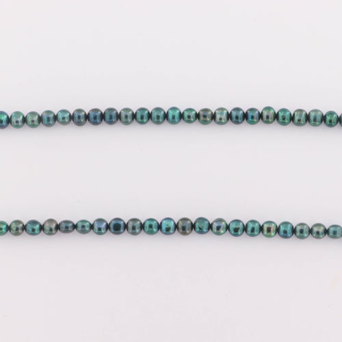 Find Ferskvandsperler, string, petroleumsblå rund indfarvet, 44 cm/4,5 mm, storkøb hos Beadhouse of Copenhagen i dag, med en altid hurtig levering!