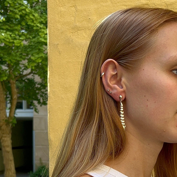 Find Earrings, ear studs conical spiral, silver-plated and gold-plated brass among our large selection of Earrings at Beadhouse of Copenhagen today. Remember free shipping over DKK 400