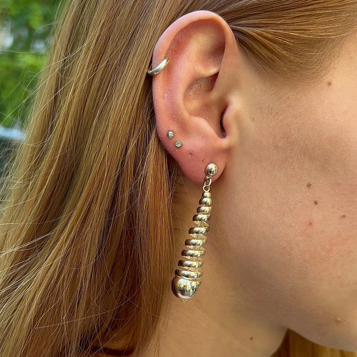 Find Earrings, ear studs conical spiral, silver-plated and gold-plated brass among our large selection of Earrings at Beadhouse of Copenhagen today. Remember free shipping over DKK 400