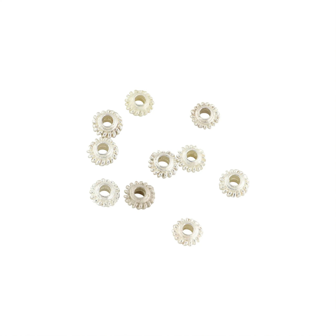 Metalperler, filigran rillet hjul, forsølvet messing, 5-7 mm. storkøb BOC