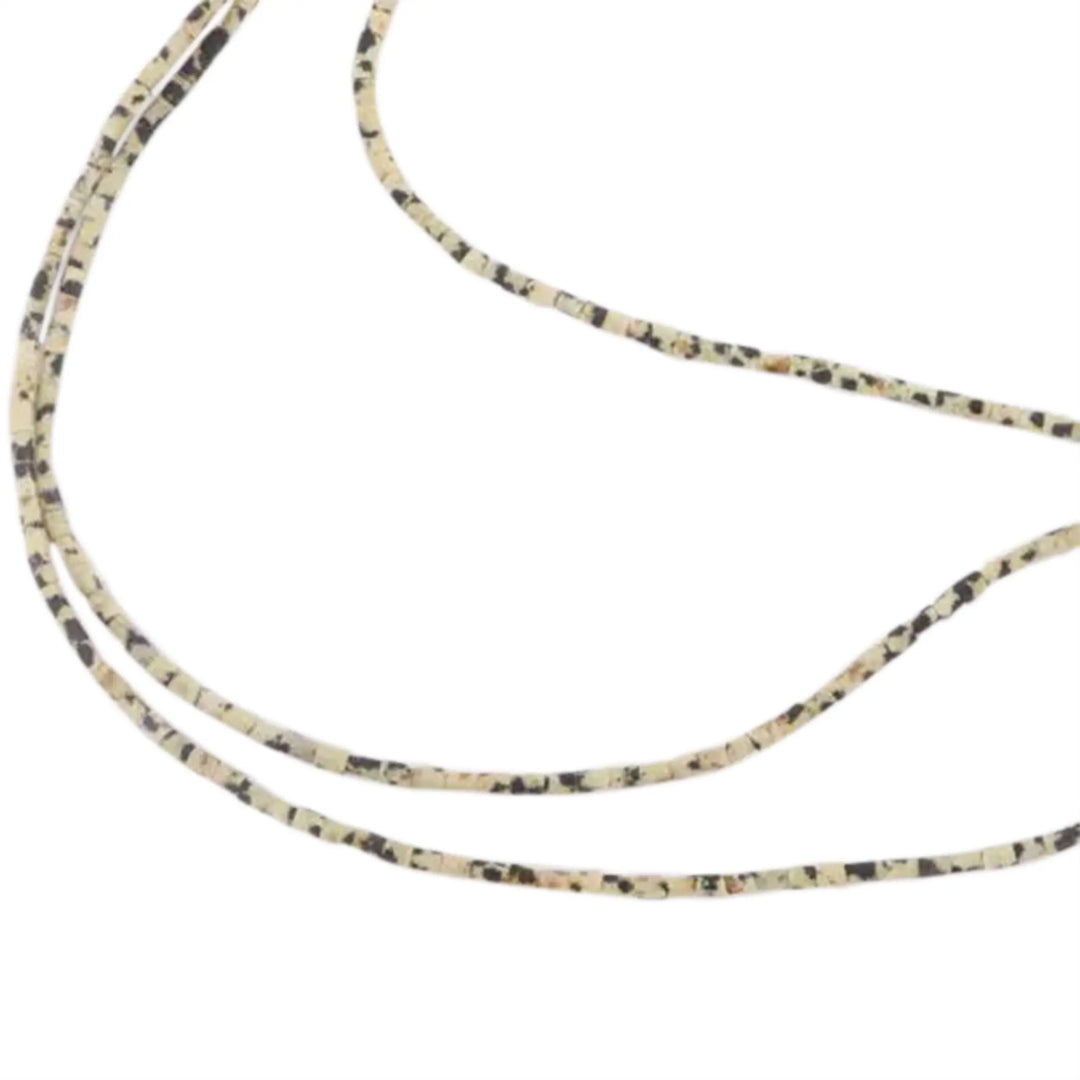 Gemstone beads, string, Dalmatian jasper matte, tube 2.5 x 3-3.5 mm 