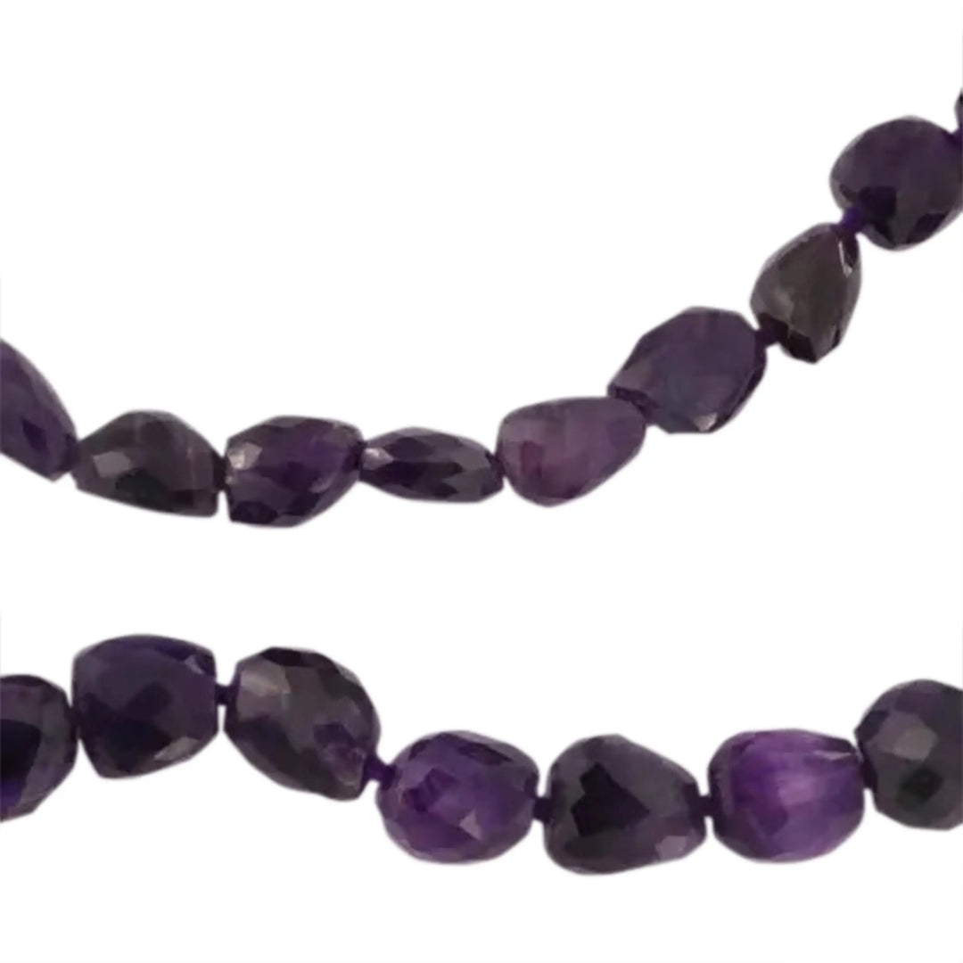 Gemstone beads, string, amethyst dark nugget faceted, 15 x 13 mm 