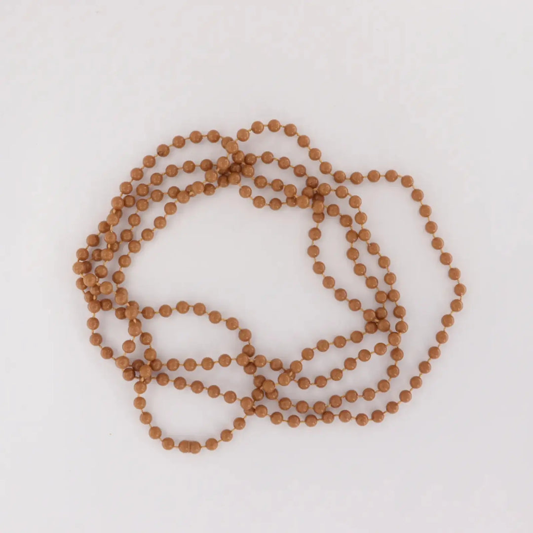 Necklace with plastic beads on string 