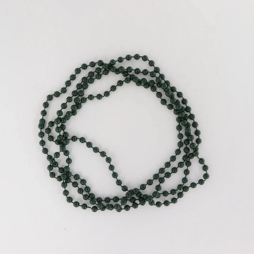 Necklace with plastic beads on string 
