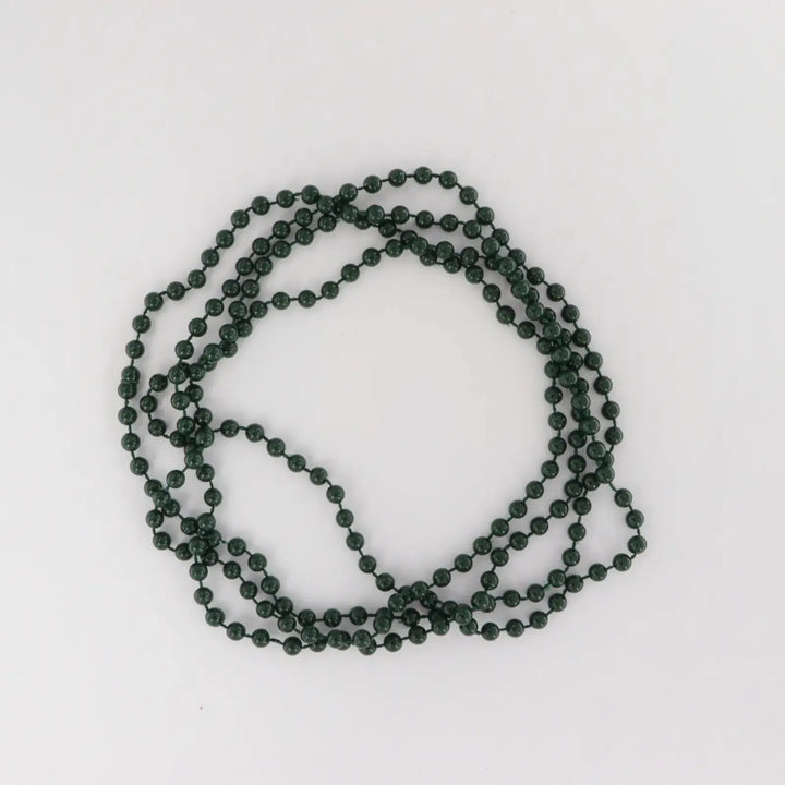 Necklace with plastic beads on string 