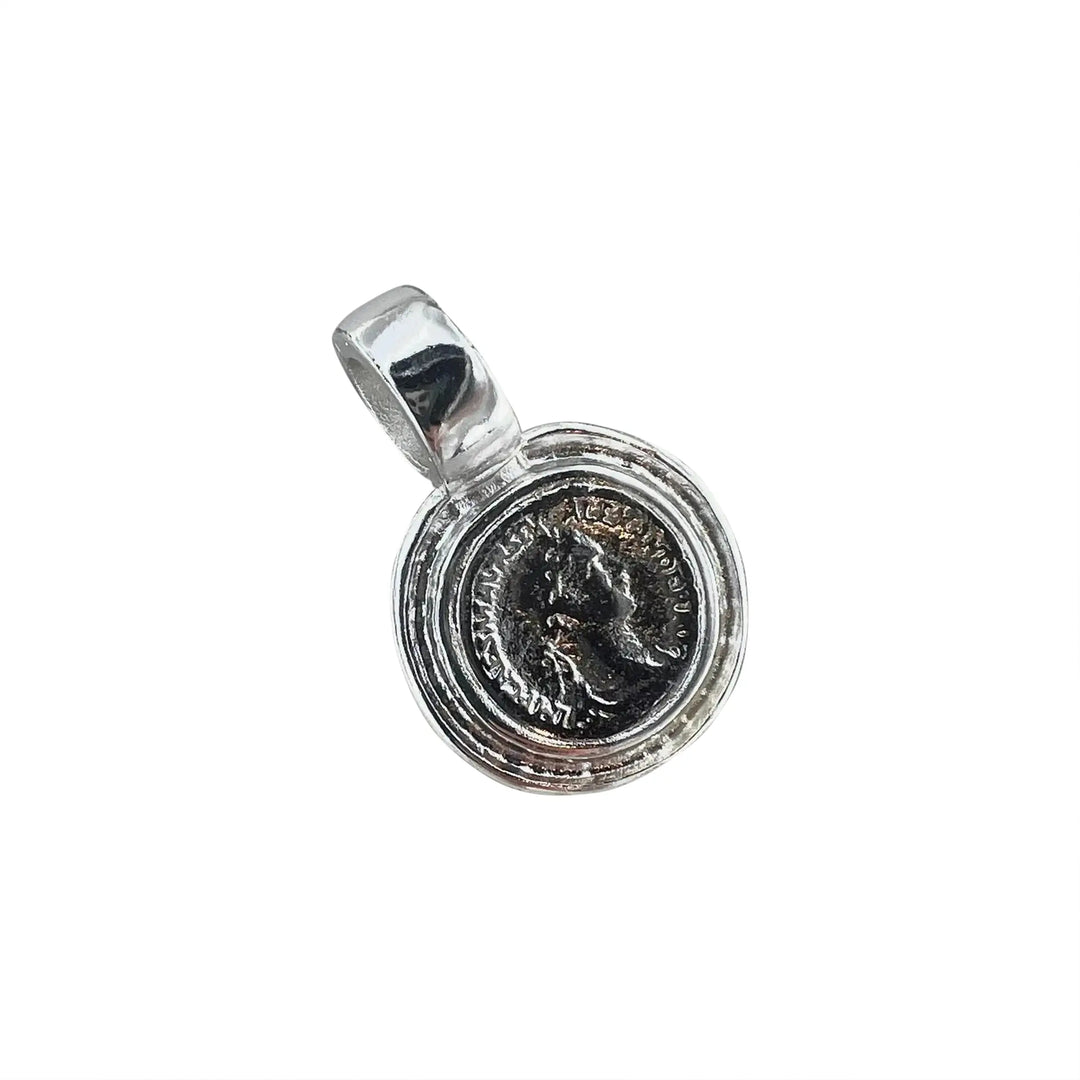 Pendant, coin, silver-plated brass. 31 x 25 mm 