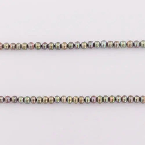Ferskvandsperler, string, lys grå iris potato indfarvet, 3,5 x 4,5 mm BOC