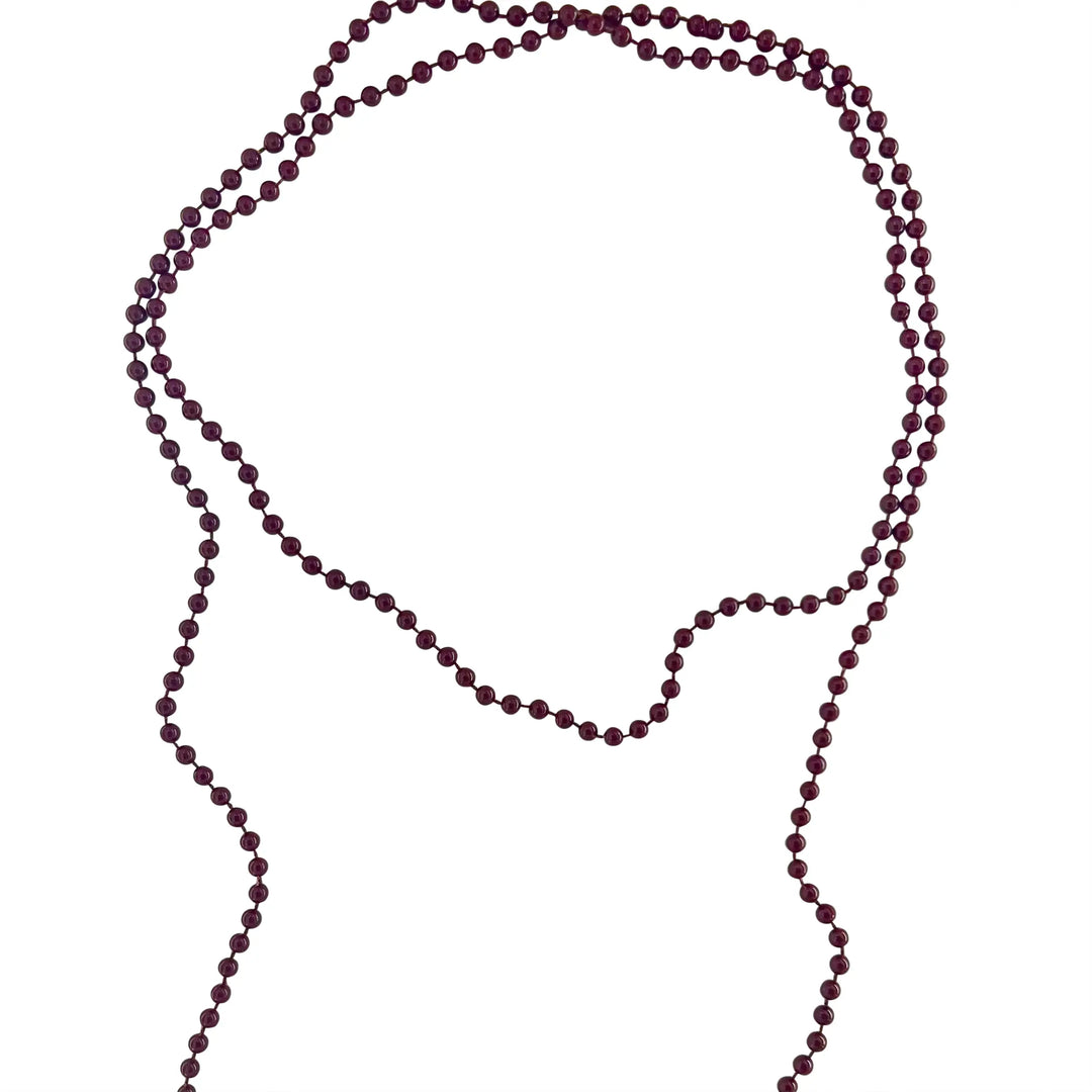 Necklace with plastic beads on string 