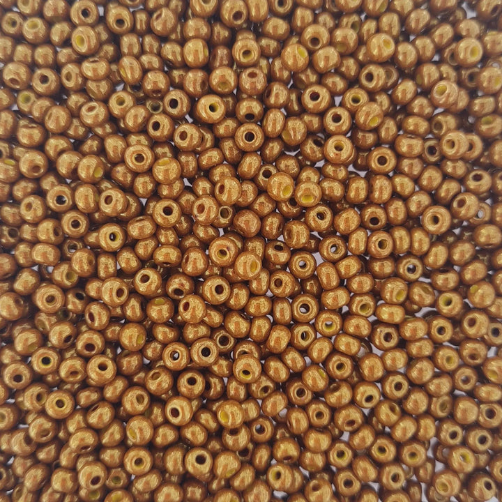 Guld glasperler, preciosa, shiny coated dark gold Preciosa
