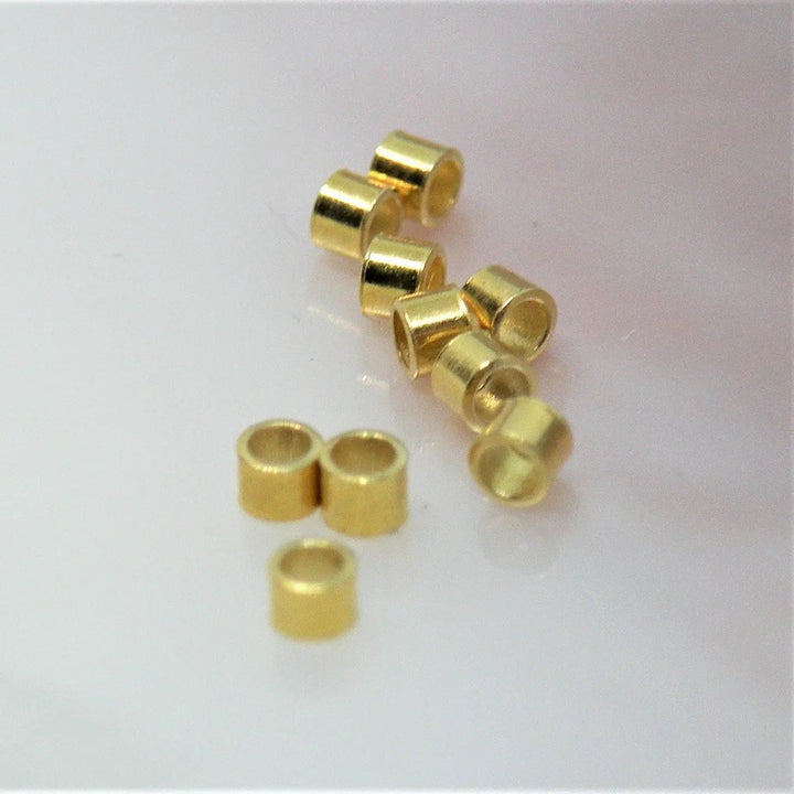 Crims. klemmeperler i forgyldt sterlingsølv, cylinder formet, 2x1,5mm Fritz