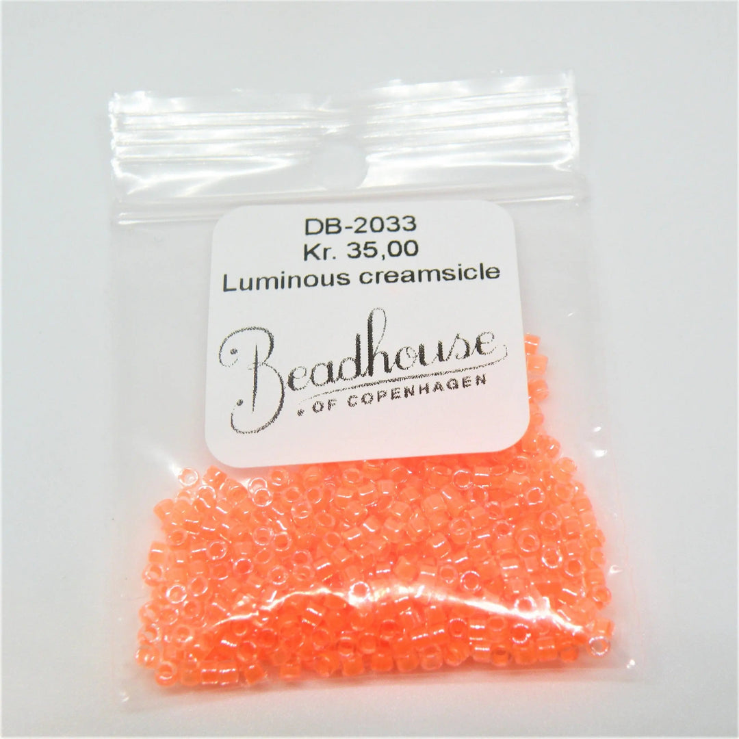 Orange glasperler, miyuki delica beads, luminous creamsicle Krea