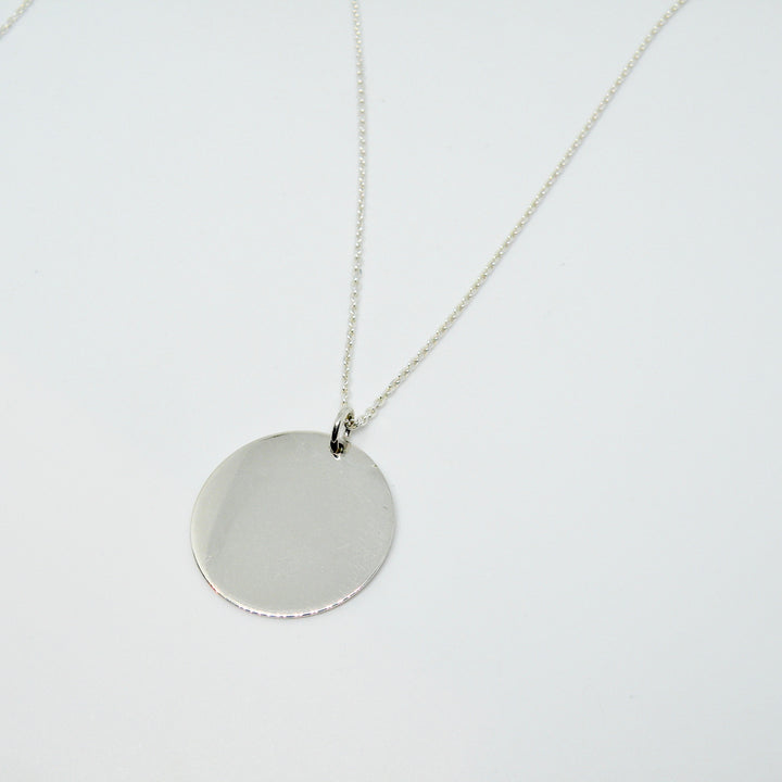 Find Vedhæng, rundt dog tag, sterlingsølv, 30 mm hos Beadhouse of Copenhagen i dag, med en altid hurtig levering!