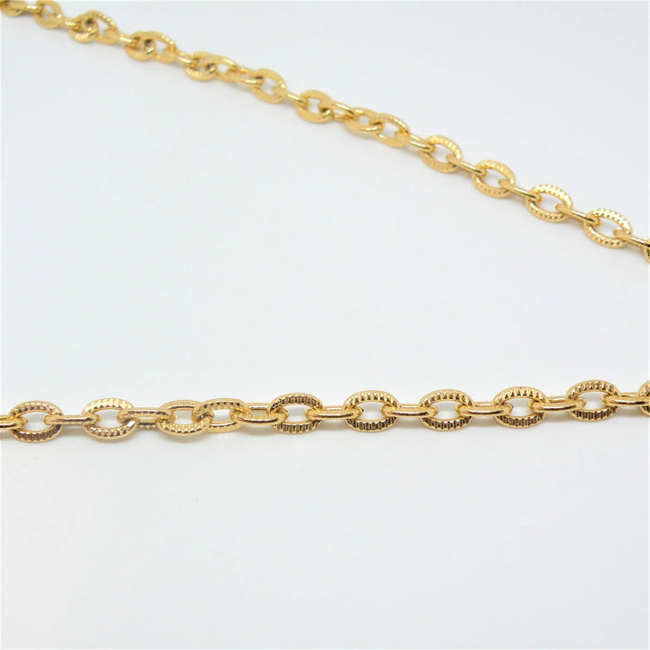 Meterkæde, rillet flad anker kæde, forgyldt aluminium, 5,5 mm Beadhouse of Copenhagen